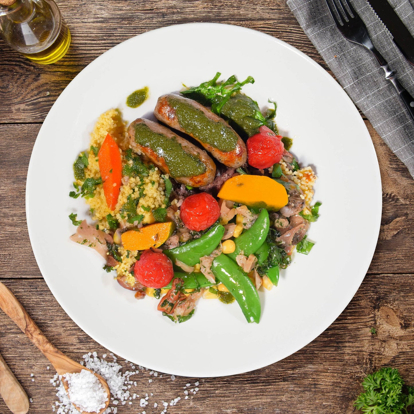 A. Chimichurri Veal Sausages W/ Seasonal Greens And Pumpkin Cous Cous Mix Rice