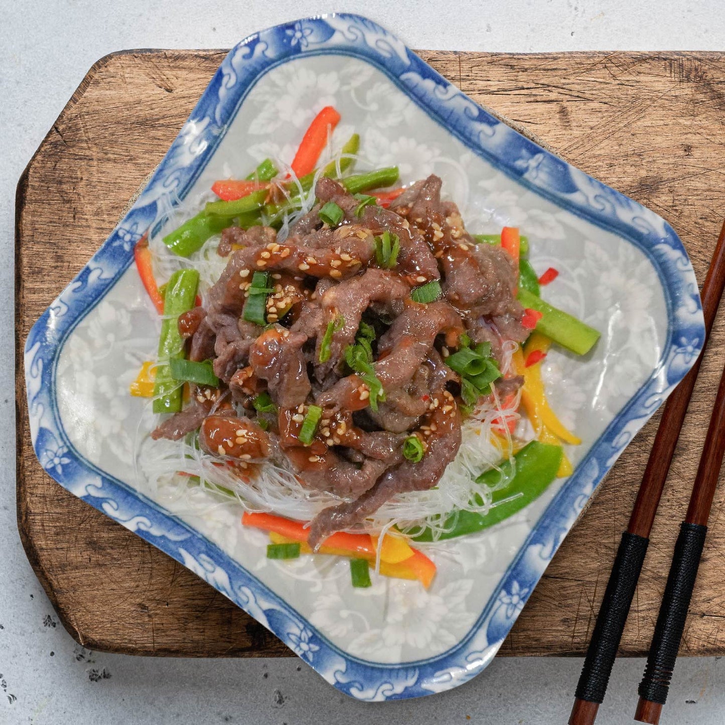 D. Stirfry Beef W/ Seasonal Vegetable And Healthy Vermicelli Noodles