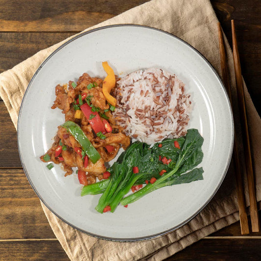 Tomato Garlic Stirfry Chicken W/ Seasonal Greens And Mix Grain Rice