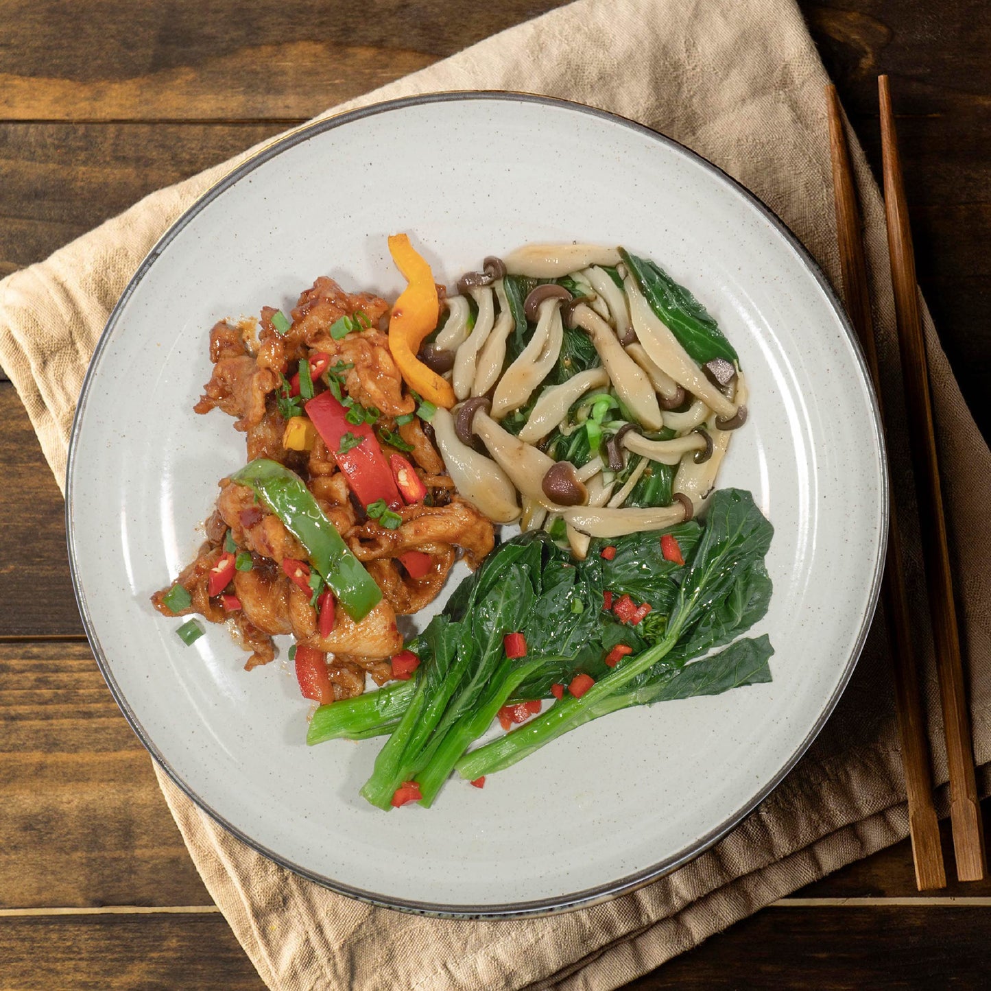 Tomato Garlic Stirfry Chicken Served W/ Seasonal Greens