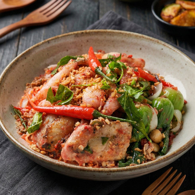 Fittery Kaho Soi Thai seafood signature meal with seasonal vegetables and healthy rice noodles in a bowl.
