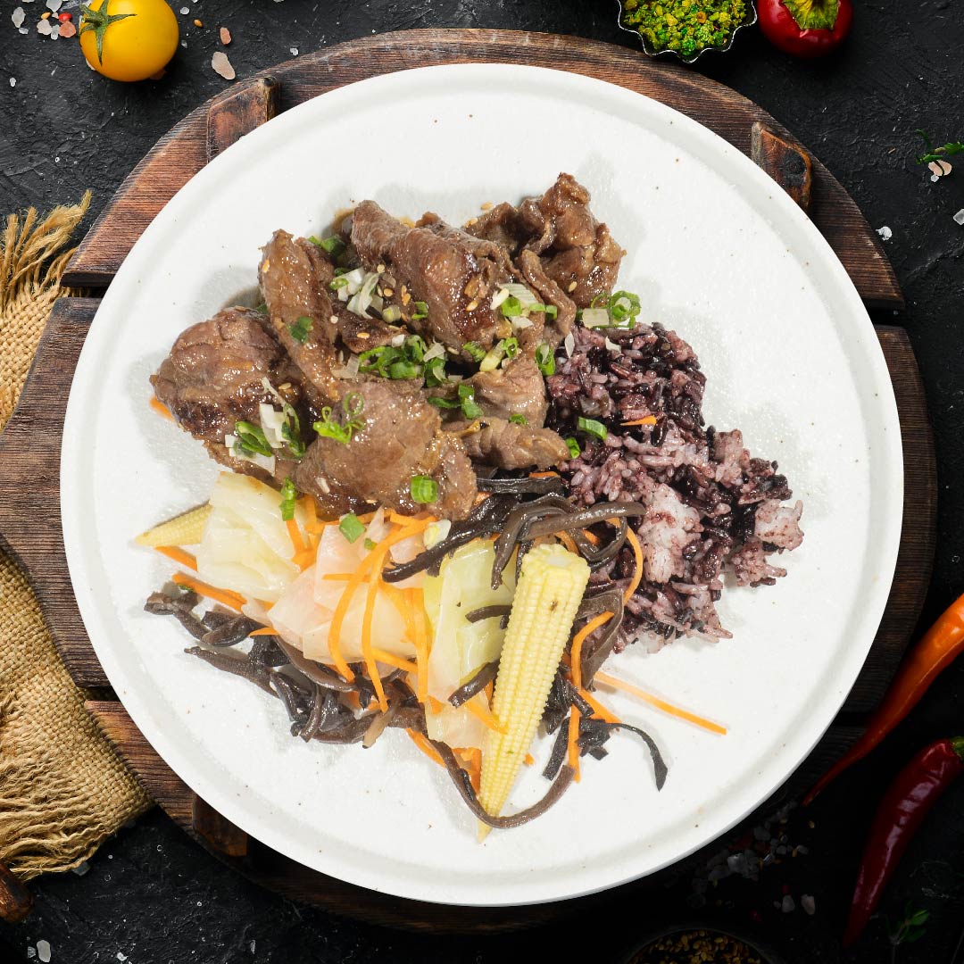 B. Korean Beef Bulgogi W/ Assorted Stir-Fry Vegetables And Purple Grain Rice
