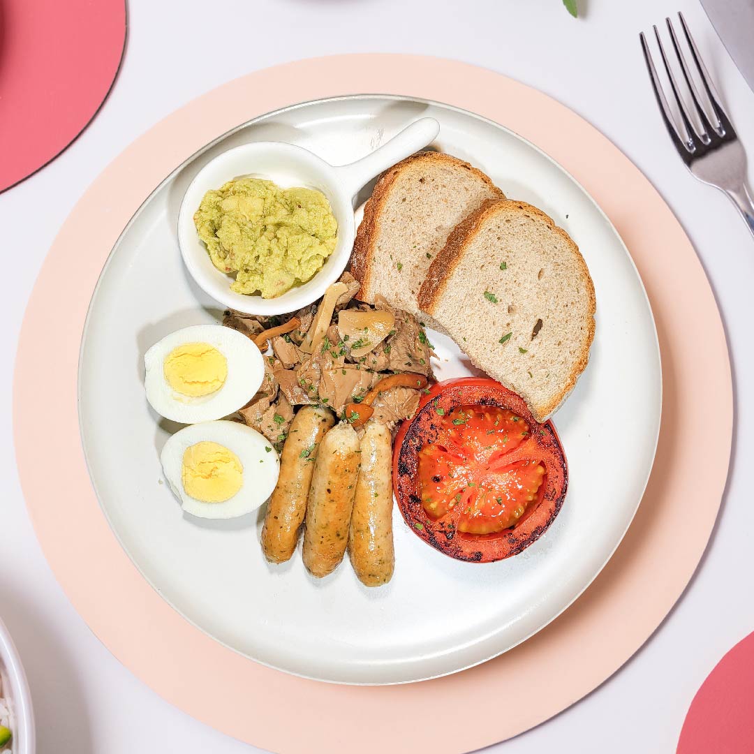 Boiled Eggs W/ Chicken Sausages, Grilled Tomato, Mushrooms, Guacamole And Rye Bread