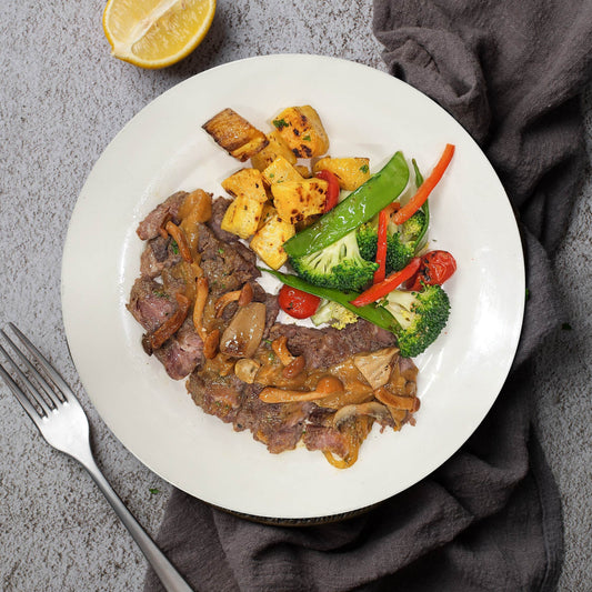 Grilled Rib Eye Steak W/ Sautee Vegetables, Baked Sweet Potato And Mushroom Sauce
