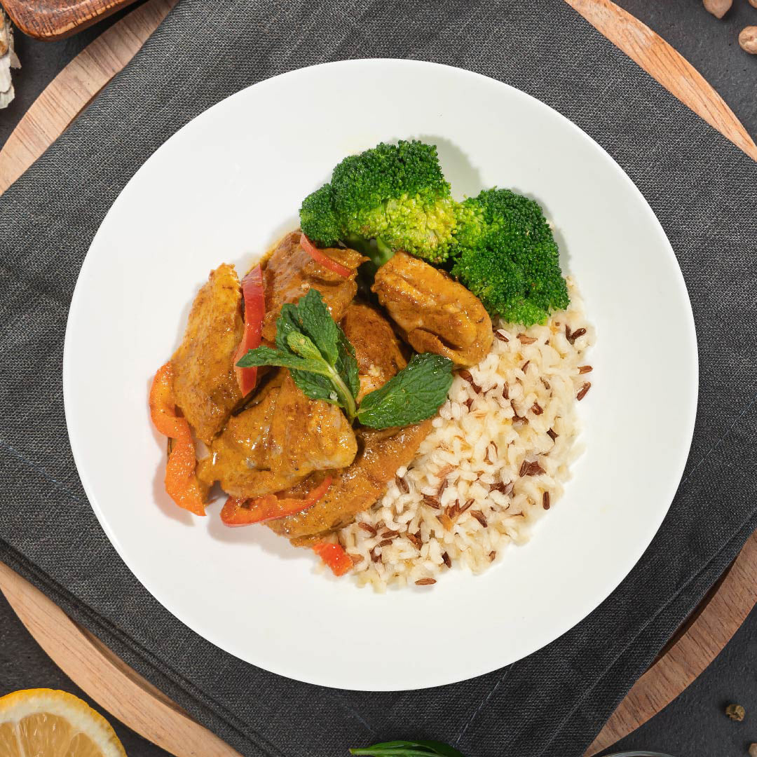 B. Tandoori Chicken W/ Seasonal Vegetable And Mix Herb Cous Cous And Quinoa Mix Rice