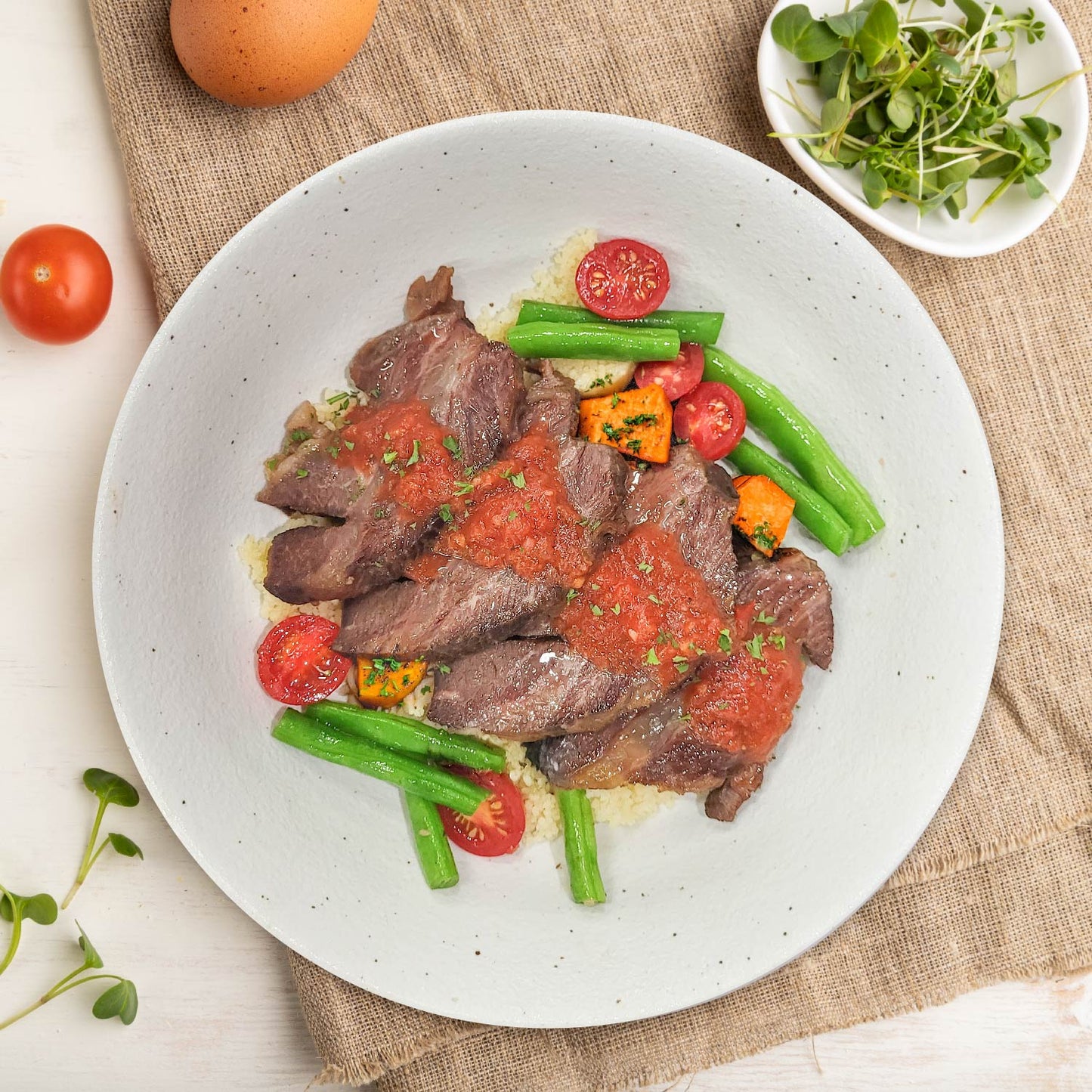A. Braised Beef Mince In Red Wine Sauce W/ Seasonal Vegetables And Pumpkin Couscous Mix Rice
