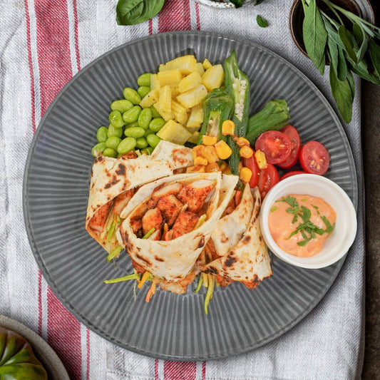 Grilled Chicken Tortilla Wrap W/ Mix Greens And Low Fat Sriracha Mayonnaise
