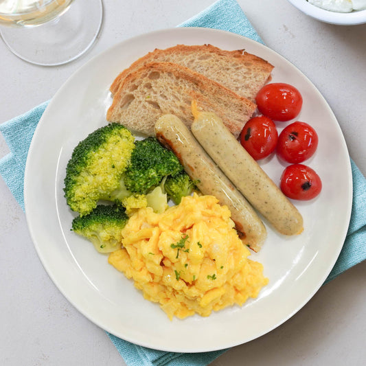 Scrambled Eggs w/ Veal Sausages and Rye Bread