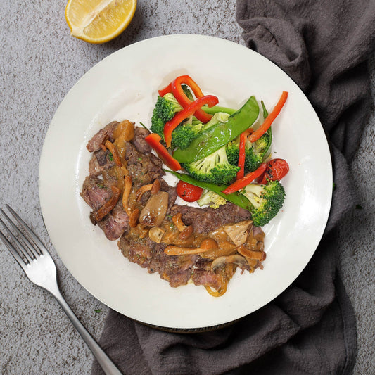 Grilled Rib Eye Steak W/ Sautee Vegetables And Mushroom Sauce