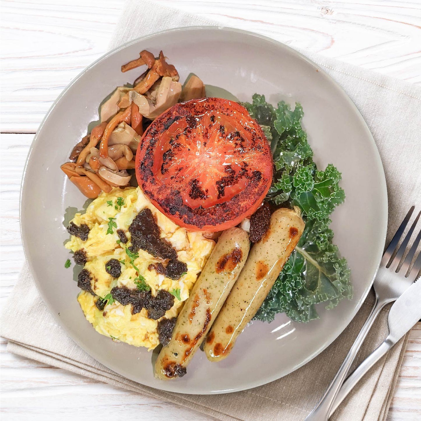Scrambled Egg W/ Truffle, Chicken Sausage, Grilled Tomato And Mix Mushrooms