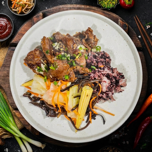 Korean Beef Bulgogi W/ Assorted Stir-Fry Vegetables And Purple Grain Rice