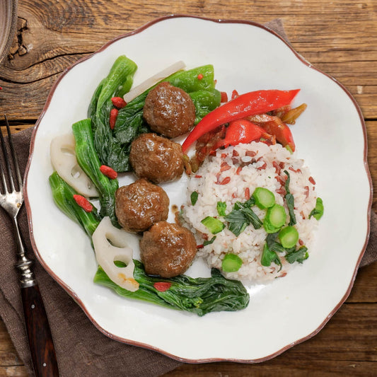 D. Chu Hou Braised Meatball W/ Seasonal Greens And Vegetable Rice