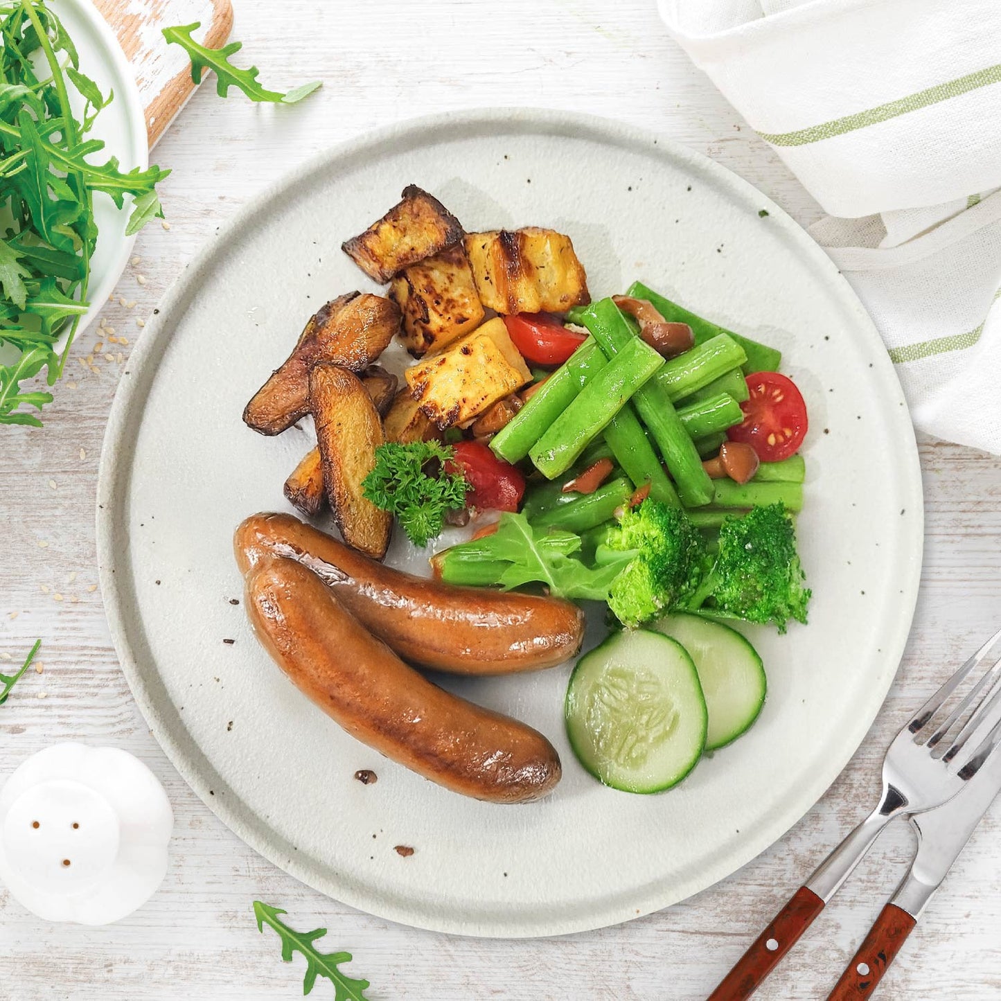 A. Country Style English Sausages W/ Onion Sauce, Seasonal Greens And Baked Potato