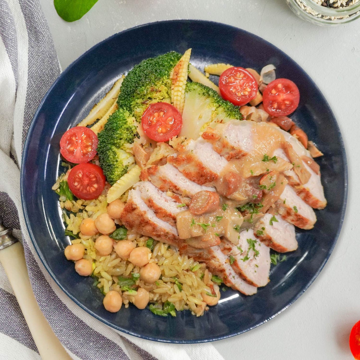 A. Italian Grilled Pork Loin w/ Chickpeas Mix Cous Cous And Mushroom Garlic Sauce