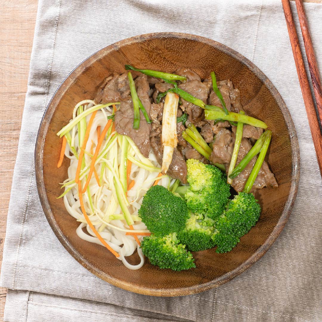C. Stir Fry Beef W/ Chinese Leeks, Sauteed Greens And Chinese Noodles