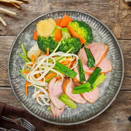 Braised Duck Breast W/ Plum Sauce, Seasonal Greens And Chinese Noodles
