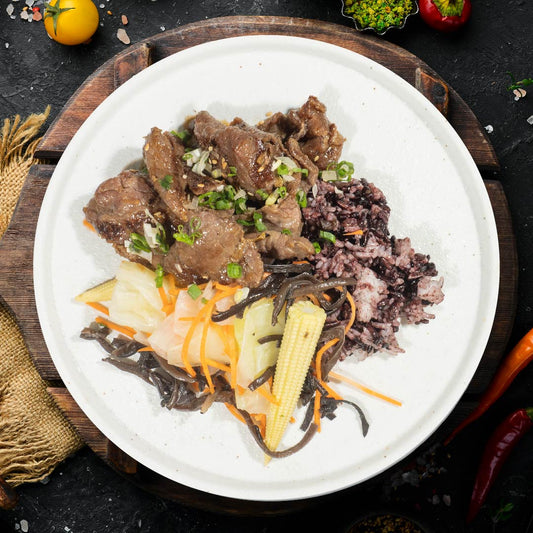 B. Korean Beef Bulgogi W/ Assorted Stir-Fry Vegetables And Purple Grain Rice