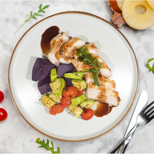 Grilled Pork Loin w/ Balsamic Onion Sauce, Seasonal Vegetables And Garlic Thyme Sweet Potatoes
