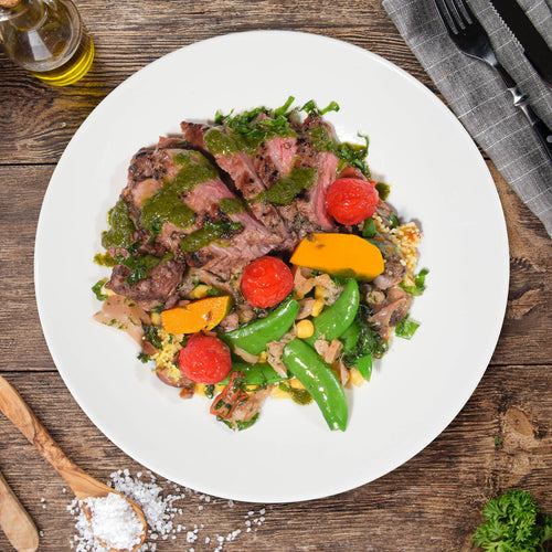 Chimichurri Grass Fed Ribeye Steak W/ Seasonal Greens And Pumpkin Cous Cous