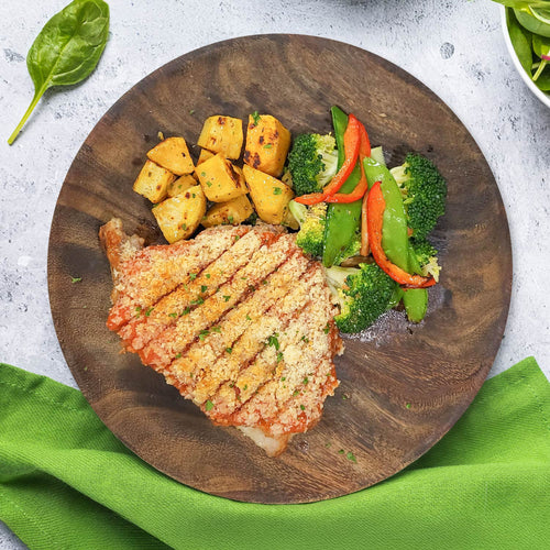 Healthy Pork Schnitzel Served W/ Roast Vegetables, Sweet Potato And Lemon Garlic Aioli