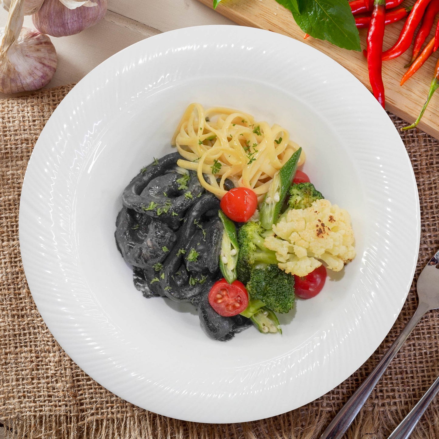 A. Squid Ink Seafood Linguine W/ Seasonal Vegetables